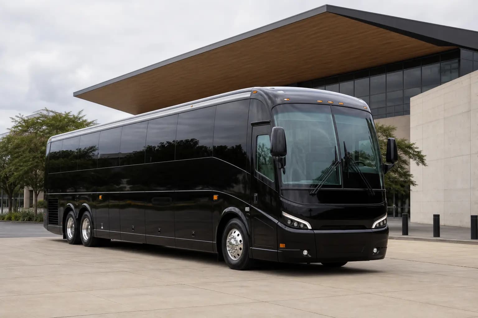 Modern unbranded black full-size motor coach.
