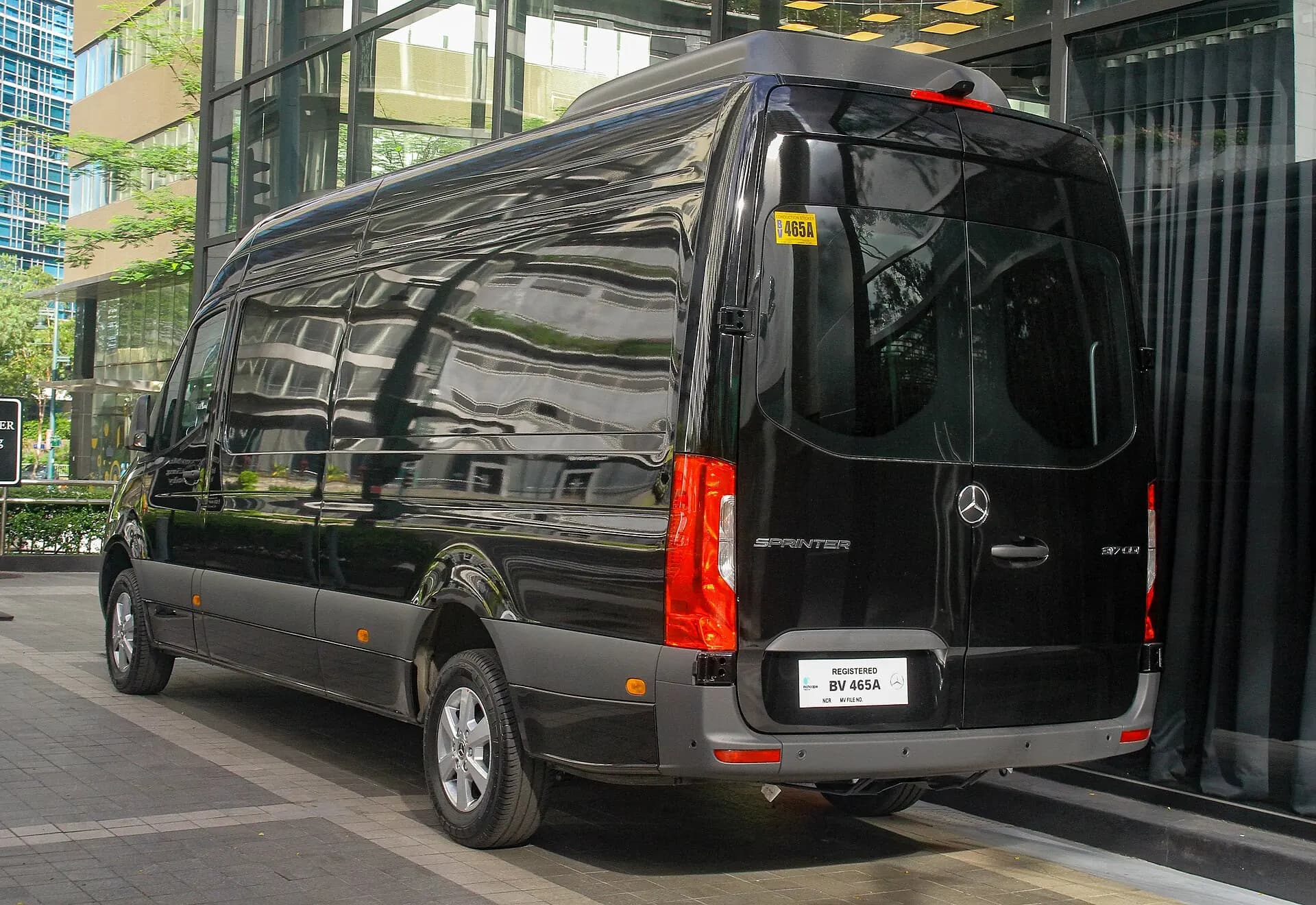 Black passenger Sprinter representing the iWelcome fleet network