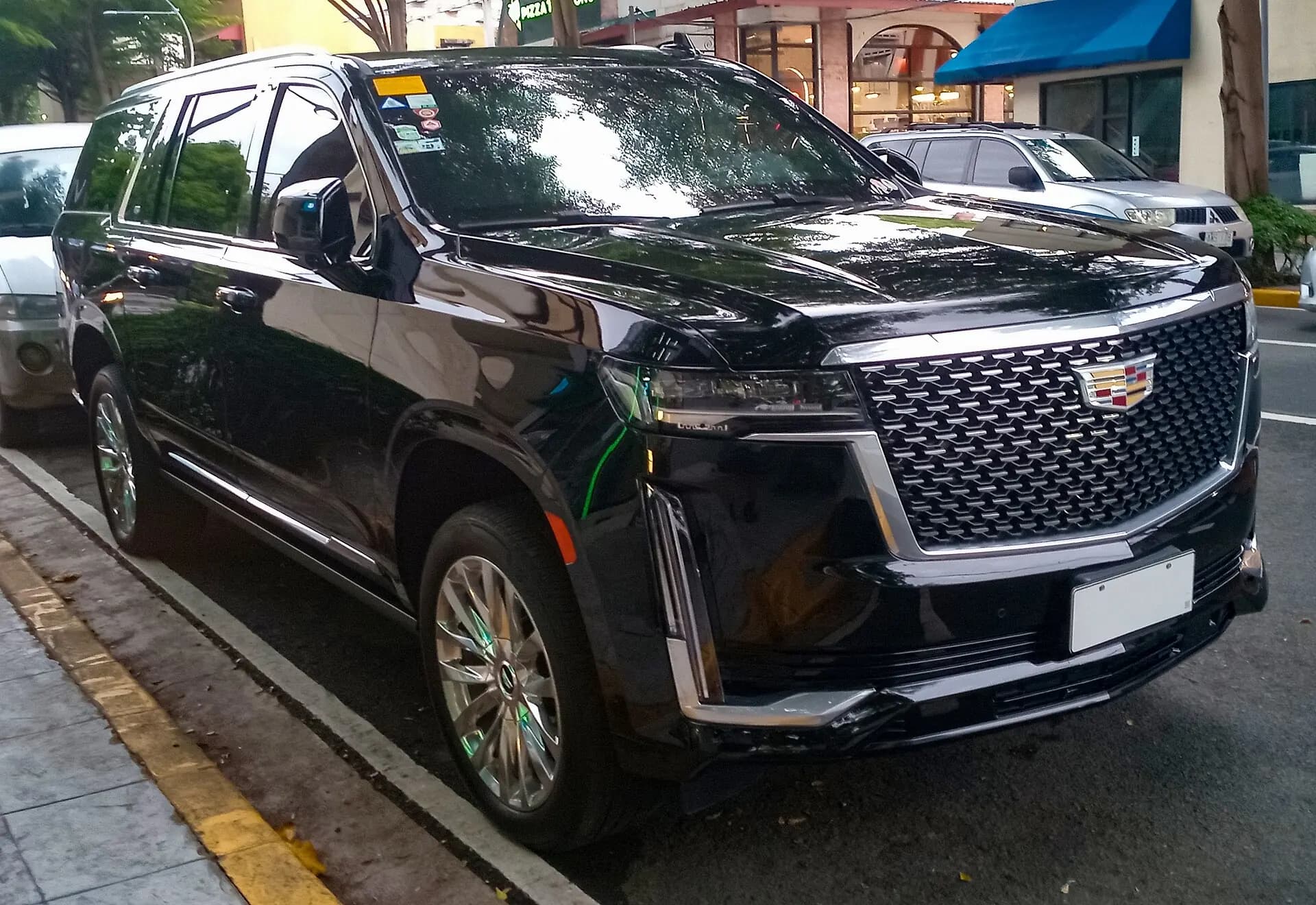 Black Cadillac Escalade ESV prepared for premium passenger service.